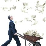 business man collecting money with a wheelbarrow